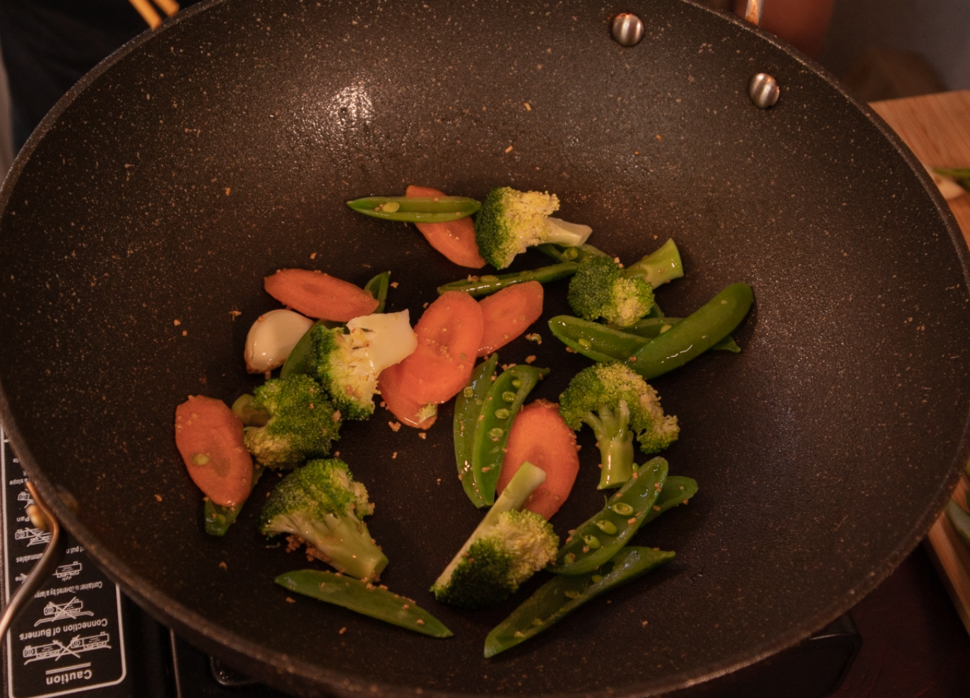 Vegetables frying in wok