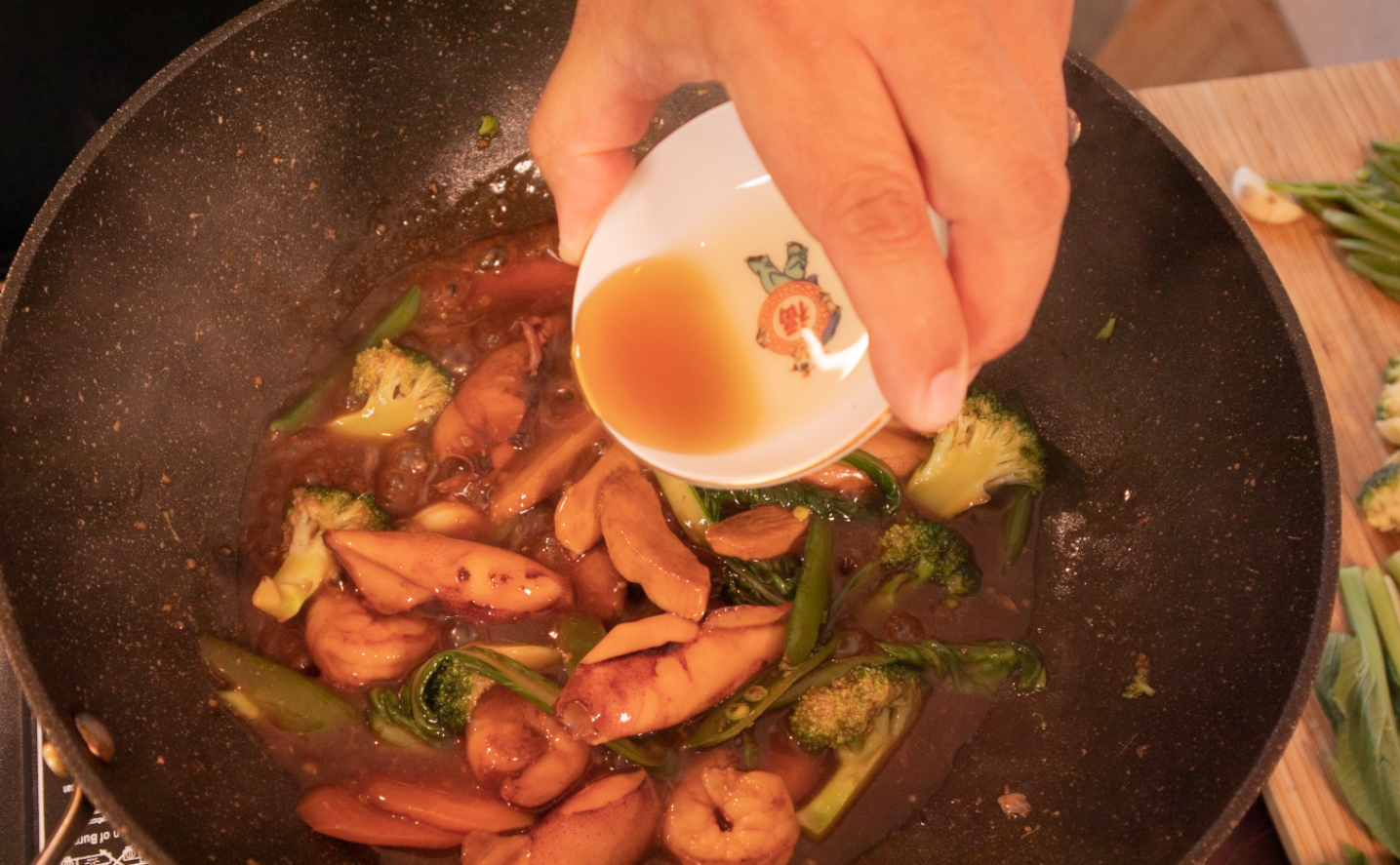 Adding sesame oil to the finished dish